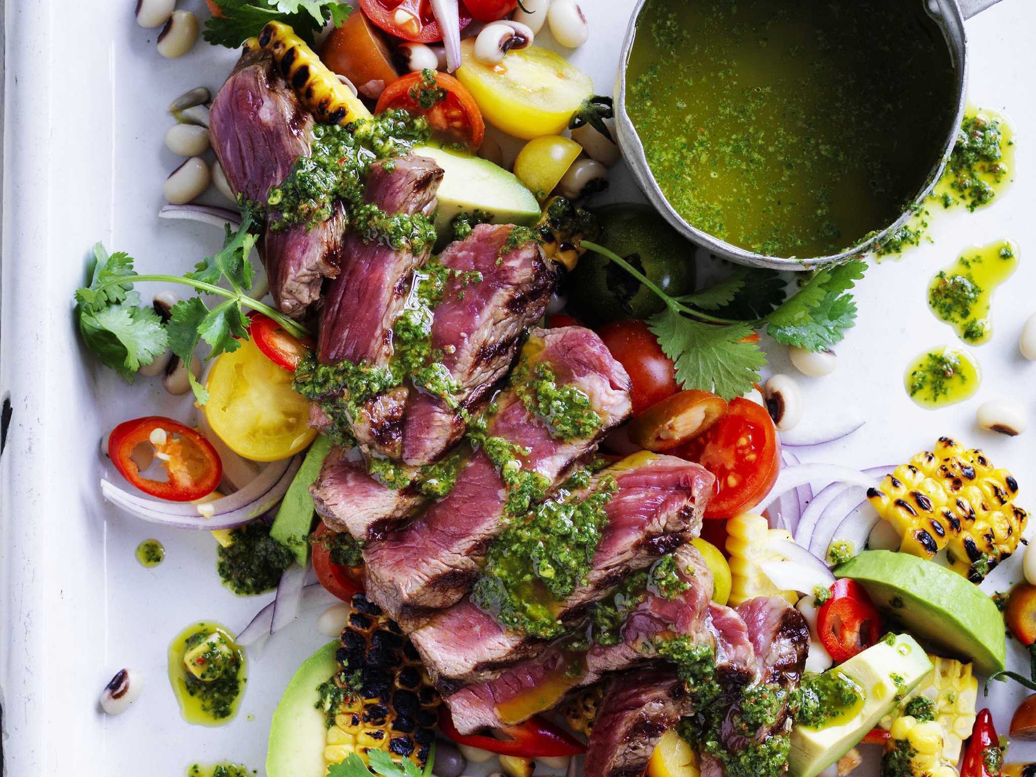 warm beef salad with black-eyed peas, corn and chimichurri