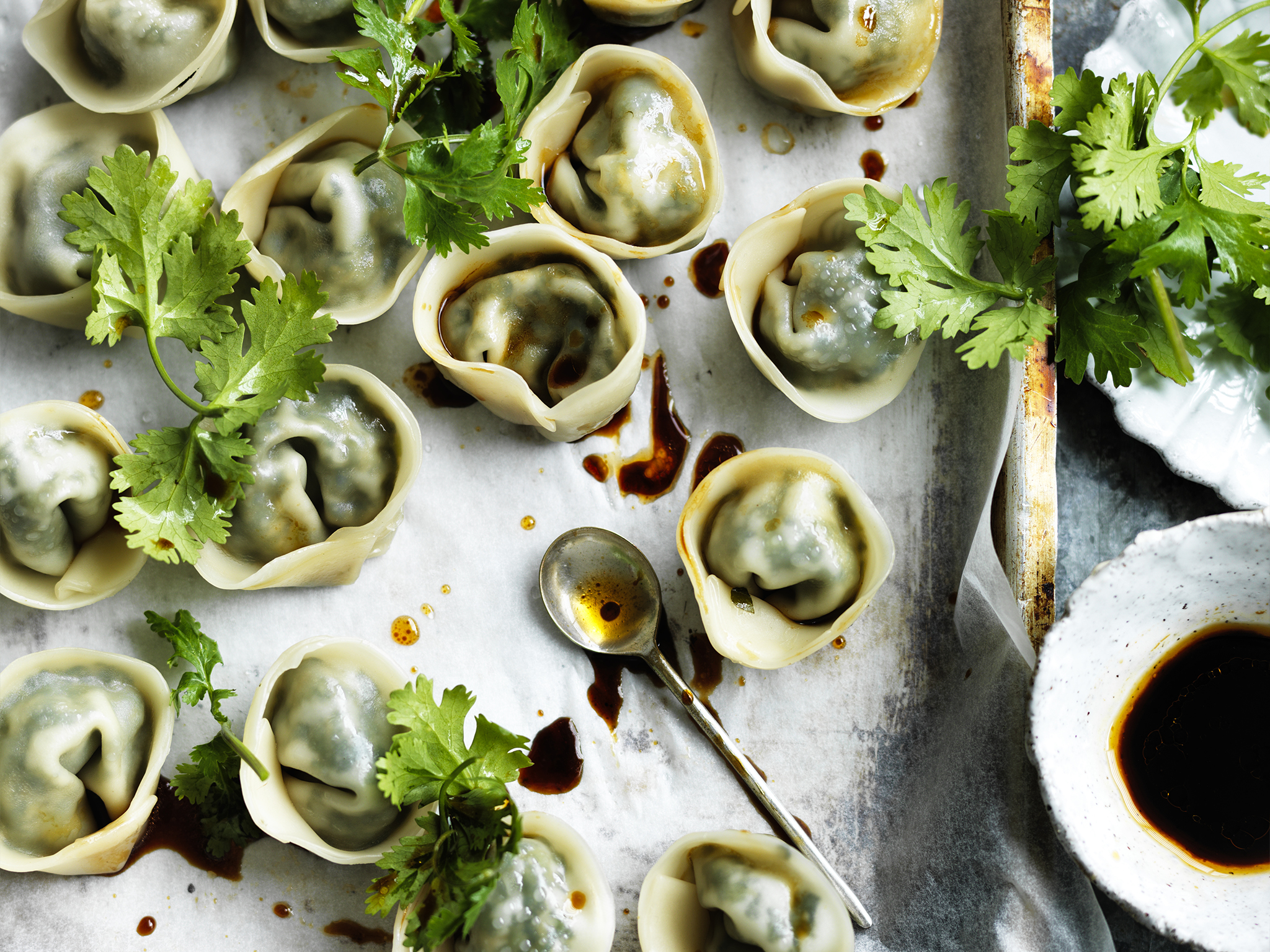 Green dumplings with soy chilli dipping sauce