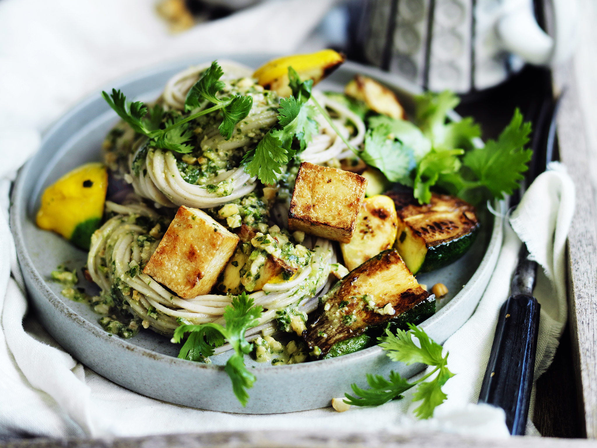 Zucchini and tofu noodles with coriander pesto