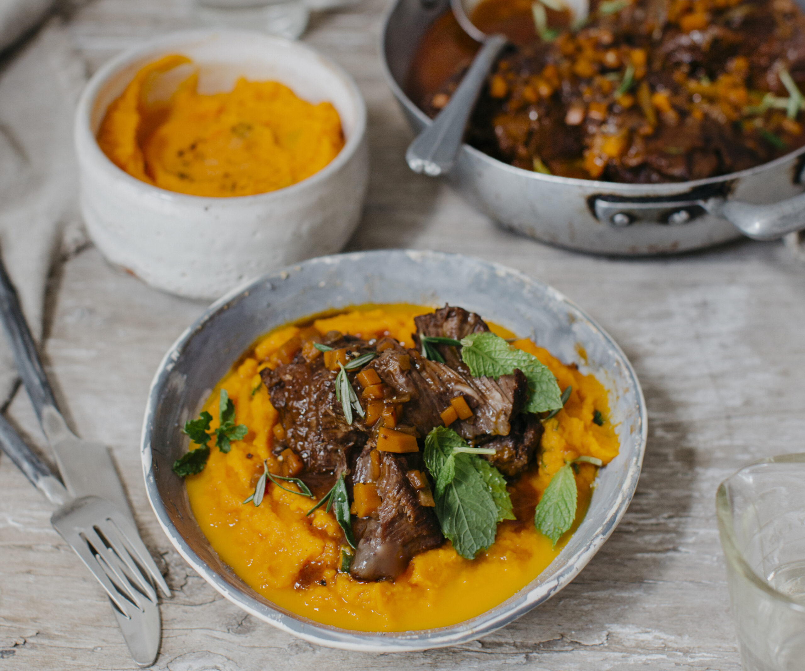 Braised beef cheeks with minted carrot puree