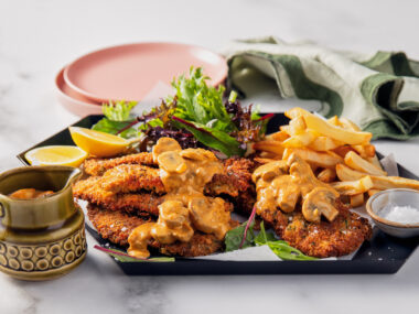 French onion pork schnitzel with stroganoff sauce